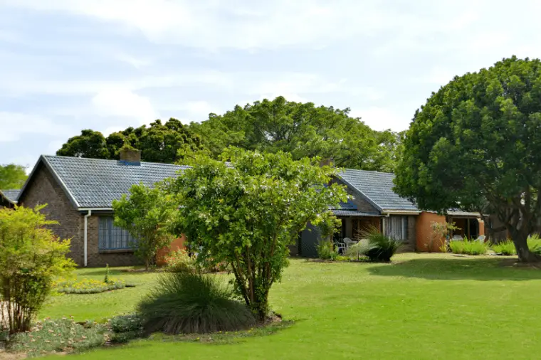 Baywater Village accommodation with lush green gardens
